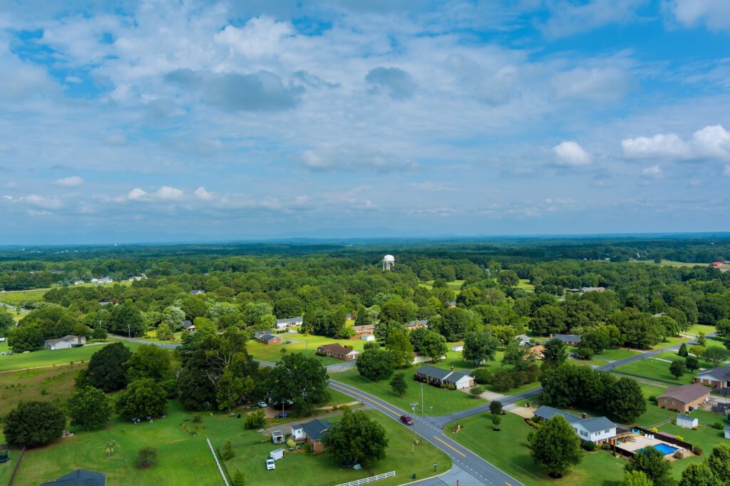 Aerial view of a Inman small town city near of forest in Atlanta GA